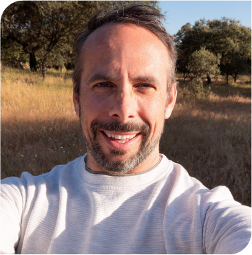 Happy man looking to the camera